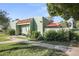 Charming single-story home with landscaped front yard and red tiled roof detail at 735 E Cochise Dr, Phoenix, AZ 85020