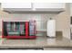 A compact, efficient kitchen featuring a red microwave, offering convenience and style at 735 E Cochise Dr, Phoenix, AZ 85020