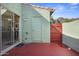 Enclosed patio featuring a sliding door and gate with mountain views at 735 E Cochise Dr, Phoenix, AZ 85020