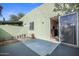 Private patio with textured walls, sliding glass doors, and space for outdoor enjoyment at 735 E Cochise Dr, Phoenix, AZ 85020
