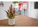 Floral centerpiece on a wooden dining table; patio is visible in the background at 735 E Cochise Dr, Phoenix, AZ 85020
