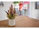 Floral centerpiece on a wooden dining table; patio is visible in the background at 735 E Cochise Dr, Phoenix, AZ 85020