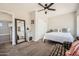 Spacious bedroom with closet, mirror, and plush carpet flooring at 7400 E Gainey Club Dr # 206, Scottsdale, AZ 85258