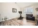 Exercise room with workout bike, mirror, and ample natural lighting at 7400 E Gainey Club Dr # 206, Scottsdale, AZ 85258