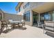 Large outdoor patio with ample seating and views of the house at 7400 E Gainey Club Dr # 206, Scottsdale, AZ 85258