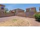 Backyard with gravel and block wall offers privacy and potential at 9534 N 82Nd Ln, Peoria, AZ 85345