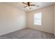 Bedroom with a ceiling fan and natural light from the window at 9534 N 82Nd Ln, Peoria, AZ 85345
