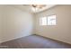 Bedroom featuring carpet floors and a window providing natural light at 9534 N 82Nd Ln, Peoria, AZ 85345