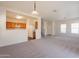 Bright and airy living space with an open layout, seamlessly connected to the kitchen at 9534 N 82Nd Ln, Peoria, AZ 85345