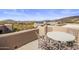 Rooftop deck with seating and panoramic views of the surrounding desert landscape at 9802 E Hidden Valley Rd, Scottsdale, AZ 85262