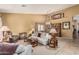 Spacious living room and dining area, perfect for entertaining guests at 10413 E Emelita Ave, Mesa, AZ 85208