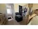 Bedroom leading to bathroom with chair and walk-in closet at 11596 W Sierra Dawn Blvd # 247, Surprise, AZ 85378
