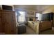 Charming bedroom featuring natural light, a comfortable bed, and classic furnishings at 11596 W Sierra Dawn Blvd # 247, Surprise, AZ 85378