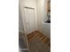 Convenient laundry room features a washer and dryer, shelving, and durable vinyl flooring at 11596 W Sierra Dawn Blvd # 247, Surprise, AZ 85378