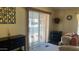 View of living room with sliding glass doors and contemporary decor at 11596 W Sierra Dawn Blvd # 247, Surprise, AZ 85378