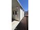 Backyard shed with double doors and side pathway at 11596 W Sierra Dawn Blvd # 247, Surprise, AZ 85378