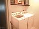 Convenient laundry room with a washer and dryer, providing a functional space for laundry tasks at 1465 S Longspur S Ln, Gilbert, AZ 85296