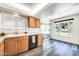 Bright kitchen with ample natural light, sleek appliances, and functional cabinet space at 16842 N 103Rd Dr, Sun City, AZ 85351