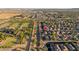 Panoramic aerial view of a neighborhood lined with mature desert landscaping, providing a serene and natural environment at 17416 W Ventura St, Surprise, AZ 85388