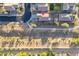 Aerial view of a residential neighborhood with desert landscaping, homes with private backyards, and nearby roads at 17416 W Ventura St, Surprise, AZ 85388