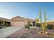 Charming single-story home with xeriscaped front yard and a large ocotillo cactus at 17416 W Ventura St, Surprise, AZ 85388
