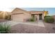 A charming single-story home with desert landscaping at 17416 W Ventura St, Surprise, AZ 85388