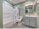 This full bathroom is equipped with updated vanity and shower over tub at 2122 E Radcliffe Dr, Tempe, AZ 85283