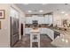 Modern kitchen featuring white cabinets, stainless steel appliances, and a functional layout at 21893 N 261St N Ave, Buckeye, AZ 85396