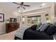 A stylish main bedroom with a large bay window and a ceiling fan at 21893 N 261St N Ave, Buckeye, AZ 85396