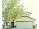 Charming home featuring stucco siding, a two-car garage and mature landscaping in a well-maintained neighborhood at 22523 W Pima St, Buckeye, AZ 85326