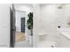 Modern bathroom featuring walk-in shower, tile flooring, and a neutral color palette at 24724 N 119Th Pl, Scottsdale, AZ 85255