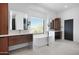 Modern bathroom with a soaking tub and vanity with great natural light at 24724 N 119Th Pl, Scottsdale, AZ 85255