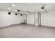 Spacious three car garage with sealed concrete flooring at 24724 N 119Th Pl, Scottsdale, AZ 85255