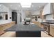 Elegant kitchen with a large island, stainless steel appliances, and modern lighting at 24724 N 119Th Pl, Scottsdale, AZ 85255