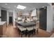 Modern kitchen features a large island with seating, stainless steel appliances, and a skylight at 24724 N 119Th Pl, Scottsdale, AZ 85255