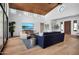 Bright and open living room with vaulted ceilings, hardwood floors, and floor-to-ceiling windows at 24724 N 119Th Pl, Scottsdale, AZ 85255