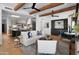 Open floor plan featuring a cozy living room and a gourmet kitchen with an island at 24724 N 119Th Pl, Scottsdale, AZ 85255