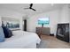 A well-lit main bedroom with hardwood floors, a fireplace, and modern interiors at 24724 N 119Th Pl, Scottsdale, AZ 85255