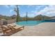 Lounge poolside and take in desert mountain views from this relaxing backyard oasis at 24724 N 119Th Pl, Scottsdale, AZ 85255