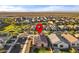 Aerial view of the property showcases desert surroundings and well-planned community at 25969 W Tina Ln, Buckeye, AZ 85396