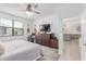 Bedroom featuring a large window and walk in closet at 37287 N Azteca Rd, San Tan Valley, AZ 85140