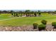 Expansive green space with walking path and manicured landscaping, ideal for outdoor activities at 37287 N Azteca Rd, San Tan Valley, AZ 85140