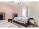 This bedroom has 2 twin beds, carpet and neutral walls at 3821 N 125Th Dr, Avondale, AZ 85392