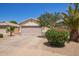 Charming home featuring a two-car garage, well-maintained landscaping, and a welcoming entrance at 3821 N 125Th Dr, Avondale, AZ 85392