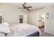The primary bedroom connects to the bathroom and kitchen for convenience at 3821 N 125Th Dr, Avondale, AZ 85392