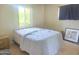 Modest bedroom featuring laminate floors and natural light at 4030 N 33Rd Pl, Phoenix, AZ 85018
