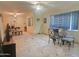 Spacious living room featuring tile floors, neutral walls, and a ceiling fan at 4030 N 33Rd Pl, Phoenix, AZ 85018