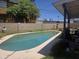 A private swimming pool adds a touch of luxury and recreation to this spacious backyard setting at 4030 N 33Rd Pl, Phoenix, AZ 85018