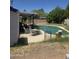 Enjoy outdoor living with a refreshing pool and a shaded area for relaxing and entertaining guests at 4030 N 33Rd Pl, Phoenix, AZ 85018