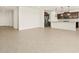 Spacious living area featuring stainless steel appliances, granite counters, and modern fixtures at 4035 S 176Th Dr, Goodyear, AZ 85338